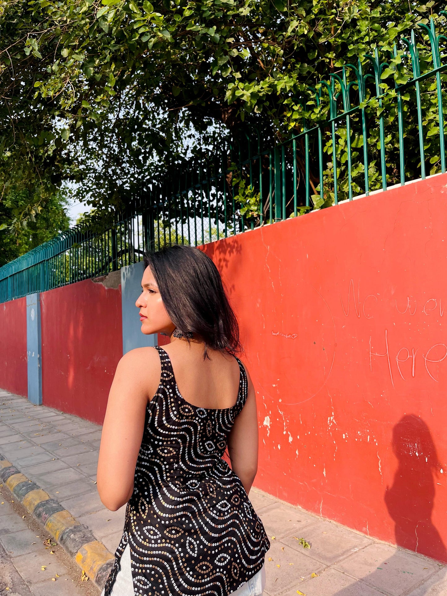 Black Sleeveless Kurti with Golden Foil Print